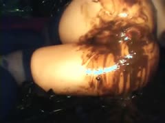The slut caused her butthole to burst with excrement.